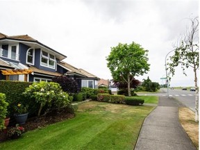 An upscale neighbourhood of homes in Richmond, where about half the population is ethnic Chinese. Chinese immgrants to Metro Vancouver have a very high rate of home ownership, a study has found.