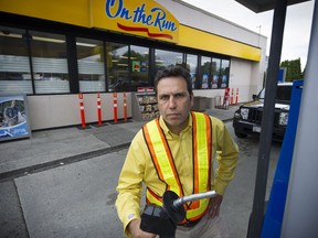 Masud Ahmadi, the owner/operator of the Esso on the Run convenience store and gas pumps in North Burnaby, at the gas station on July 11, 2016.