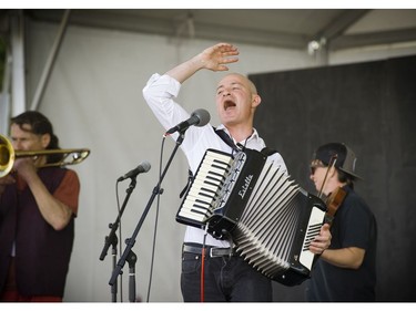 Grooving to it all-- Thousands took part in the 39th annual Vancouver Folk Festival in Jericho Beach Park in Vancouver on July 17, 2016.  Musicians from around the world performed at the dynamic and colourful festival. Here Geoff Berner thrills his fans.