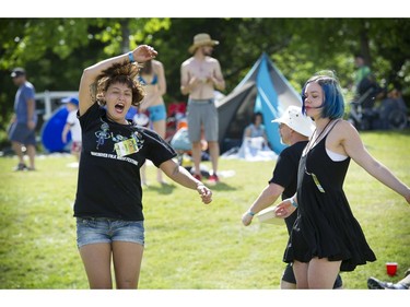 Grooving to it all-- Thousands took part in the 39th annual Vancouver Folk Festival in Jericho Beach Park in Vancouver on July 17, 2016.  Musicians from around the world performed at the dynamic and colourful festival. Here dancing to the sights and sounds of the festival.