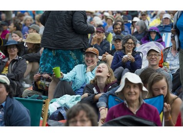 Legendary Canadian artist Bruce Cockburn fans laught as he performs at the 39th annual Vancouver Folk Festival in Jericho Beach Park in Vancouver on July 17, 2016.  Musicians from around the world performed at the dynamic and colourful festival.