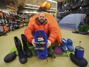 File: Mountain Equipment Co-op customer service rep Matt Armstrong Wednesday, february 4, 2015 with several pieces of gear that make winter excursions possible, and fun.