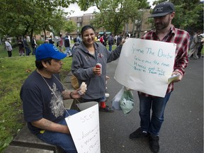 Barbara Nepinak with Derek Lacquette, left, and Derek Rolph at Oppenheimer Park ahead of the housing protest.