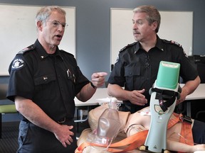 Advanced care paramedics Ron Straight (l) and Brian Twaites talks to media as St. Pauls Hospital and BC Emergency Health Services (BCEHS) announce they are conducting a landmark trial thats the first of its kind in Canada, in Vancouver, BC., July 13, 2016. It has the potential to increase the survival rate of seemingly healthy people who suffer a sudden cardiac arrest outside of a hospital setting. The ECPR trial, as it is called, involves a rapid, coordinated response by both paramedics and a cardiac team at St. Pauls Hospitals Emergency Dept.