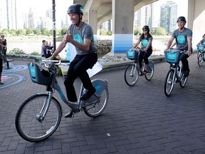 Mayor Gregor Robertson on a shared bike as The City and Vancouver Bike Share launches the first phase of the public bike share program.