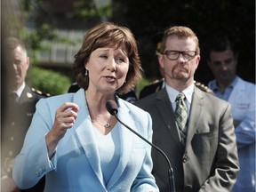 Premier Christy Clark announces a newly formed Task Force on Overdose Response to respond to the opioid (primarily fentanyl) overdose crisis in British Columbia on Wednesday, July 27, 2016. Health Minister Terry Lake is at right.