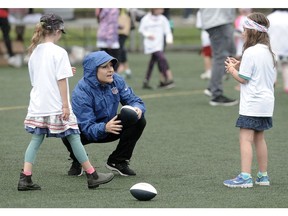 Jen Welter, the first female coach in NFL history in action as part of the NFL's Play 60 program.
