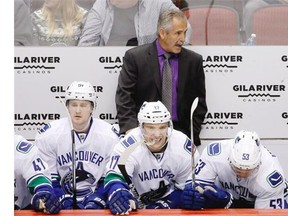 The Vancouver Canucks will have a couple of new-look lines when they meet the New York Islanders tonight at Rogers Arena. Coach Willie Desjardins is splitting up the tandem of Bo Horvat and Sven Baertschi, who have been together for much of the season. Horvat will skate tonight with Emerson Etem and Linden Vey, while Baertschi will play on a line with newly acquired centre Markus Granlund and rookie Jake Virtanen. Vancouver Canucks coach Willie Desjardins, top, shouts instructions to his players as he stands behind Jared McCann (91), Radim Vrbata (17), of the Czech Republic, and Bo Horvat (53) during the second period of the Coyotes’ NHL hockey game against the Arizona Coyotes on Wednesday, Feb. 10, 2016, in Glendale, Ariz.