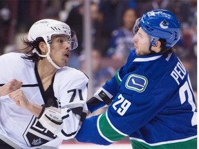 Vancouver Canucks defenceman Andrey Pedan (right) fights with Los Angeles Kings forward Jordan Nolan during a Canucks-Kings game earlier this season at Rogers Arena.