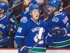 Vancouver Canucks’ Jake Virtanen (18) celebrates his goal against the San Jose Sharks during the first period of an NHL hockey game in Vancouver, B.C., on Thursday March 3, 2016.