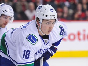 Jake Virtanen #18 of the Vancouver Canucks in action against the Calgary Flames.