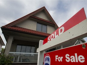 Canada's national housing agency says evidence of problematic conditions in the country's real estate market as a whole has risen from weak to moderate, with Vancouver's risk rating boosted to high.