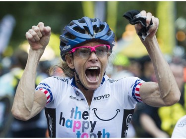 Tina Pic, age 50 the oldest rider in the race celebrates winning the the pro women's race at the Gastown Grand Prix Vancouver, July 13 2016.