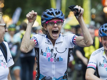 Tina Pic, ( c ) age 50 the oldest rider in the race celebrates winning the the pro women's race at the Gastown Grand Prix Vancouver, July 13 2016.