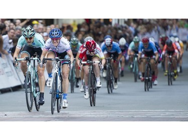 Tina Pic, ( R ) age 50 the oldest rider in the race beats Kimberly Wells (L )to win the pro women's race at the Gastown Grand Prix Vancouver, July 13 2016.