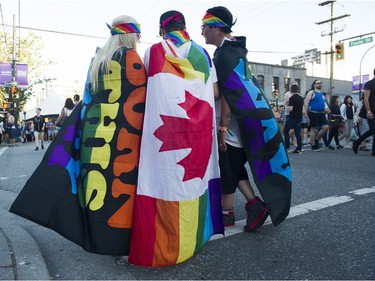 L-R Sydney MacNamara. Levi Schmidt and Shelbi Bellegerde attend theTake back the streets for Pride Weekend in the heart of the Davie Street Village, Vancouver, July 29 2016.