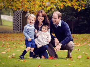 Britain's Prince William, his wife Kate, the Duchess of Cambridge and their two children Prince George (left) and Princess Charlotte pose for a photograph last October at Kensington Palace in London. The family will visit Victoria, Vancouver, Kelowna, Bella Bella and Haida Gwaii in B.C., with Yukon stops in Whitehorse and Carcross, a remote First Nations community just north of the B.C. border, late next month.