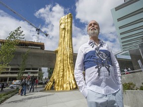 Douglas Coupland unveiled his newest creation, a statue called The Golden Tree, at Intracorp's MC2 development project at Cambie and Marine Drive in Vancouver on August 6, 2016.