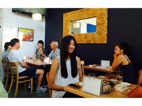 Diners enjoy Masayoshi sushi restaurant on Fraser Street in east Vancouver.