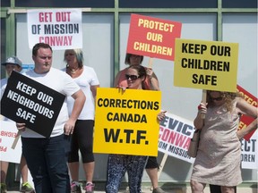 Mission, BC residents upset by the release-into-the-community of sex offender James Conway protest at the office of Mission Matsqui Fraser Valley MP Jati Sidhu in Mission, BC Friday, August 5, 2016.