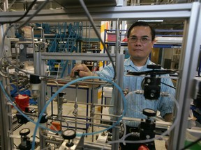 A Ballard Power engineer works in the Burnaby manufacturing and testing facility.