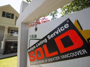 Vancouver's surge in house prices of 36 per cent over the past year was by far the highest in the world, but the new 15 per cent tax on foreign buyers is expected to slow the growth, according to a group that tracks housing prices in 37 cities.