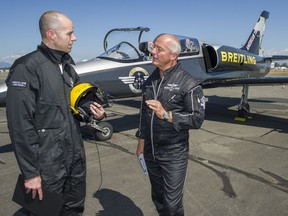Reporter Matt Robinson, left, with Breitling Jet Team leader Jacques Bothelin after their flight above the Fraser Valley in the L-39C Albatros.