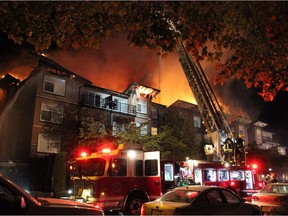 A huge fire at a four storey apartment building in Surrey has forced 101 people from their homes. Photo by Shane MacKichan for PNG.