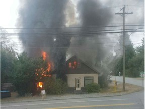 A house at Park Drive and Grosvenor Road in Surrey was destroyed by fire this morning. (Kathleen Vergara/Submitted)