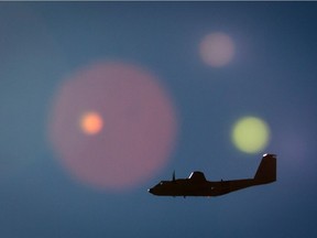 A Canadian Forces CC-115 Buffalo aircraft is silhouetted during search and rescue training by the Royal Canadian Air Force 442 Transport and Rescue Squadron at Chilliwack Airport. One of the groups vying to replace the search-and-rescue fleet of the Royal Canadian Air Force said during a visit to B.C. that they are expecting a decision from Ottawa this fall.