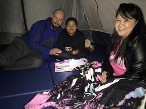 Camp Read A Lot occurred on the evening of March 3, 2016.  The gymnasium at Tillicum Community Annex school was transformed into an outdoor setting with tents, fairy lights and simulated campfires. Students, parents, siblings and school staff all arrived in their pajamas, grabbed a book, and read together in different areas of the 'camp site'. The night ended with hot chocolate and smores-on-a-stick while singing camp songs.