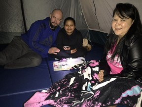 For Camp Read a Lot, the gymnasium at Tillicum Community Annex school was transformed into an outdoor setting with tents, fairy lights and simulated campfires.