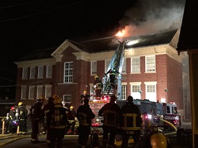 Fire crews battle a four-alarm blaze at Carleton Elementary.