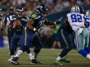 Offensive tackle J'Marcus Webb of the Seattle Seahawks pass blocks against the Dallas Cowboys during the preseason game at CenturyLink Field on August 25, 2016 in Seattle, Washington.