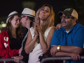 Fans are emotional while attending a public viewing of the The Tragically Hip's final concert of the "Man Machine Poem" tour in Halifax on Saturday, August 20, 2016.