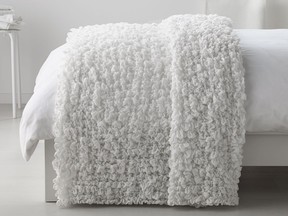 Fluffy white Ofelia blanket, $19.99 at IKEA, ikea.com.