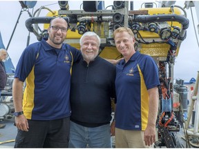 From left, Reuben Mills, Jim Delgado and Josh Chernov, the Canadian crew using a remotely-operated underwater vehicle to help Robert Ballard's Ocean Exploration Trust explore the wreck of the USS Independence.