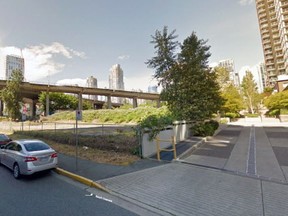 Google Streetview image of vacant lot (part of municipal address 601 Beach Crescent) between the Granville Street Bridge and a commercial residential tower that is the subject of a lawsuit filed by Concord Pacific against the ctiy.