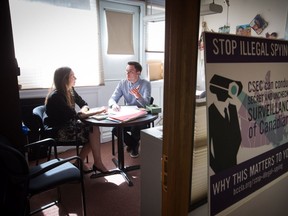 B.C. Civil Liberties Association Litigation Director Grace Pastine, left, and Executive Director Josh Paterson talk in his office, in Vancouver, B.C., on Thursday August 18, 2016. From a modest office tucked away in a corner of downtown Vancouver, the British Columbia Civil Liberties Association has made a big impact on the country's laws including changing how the terminally ill can get help from their doctors in ending their lives.