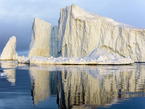 Huge Icebergs in Ilulissat, Greenland. There are beautiful shadows of icebergs.