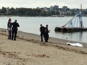 Vancouver police and the coroner are investigating after a body washed up on shore in English Bay.