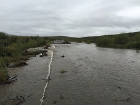 Rain floods the Dempster Highway.