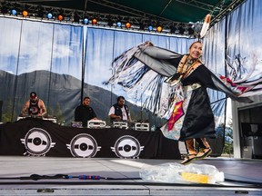 Indigenous electronic music group A Tribe Called Red performs in the Shaw Amphitheatre in Banff, Alta., on Sunday, July 31, 2016. (Daniel Katz/ Crag & Canyon/ Postmedia Network)