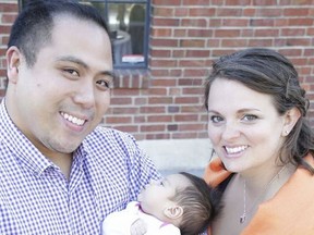 Richmond residents Richard and Kelly Belleza with their daughter who was born at Lion's Gate Hospital. Their baby had to be delivered in North Vancouver because their local hospital, a favourite site for birth tourism, was full-up.