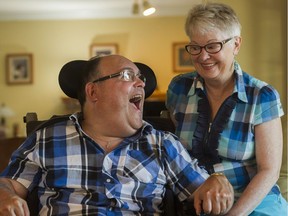 Donalda Madsen and her disabled son, Shane, at home in Langley.