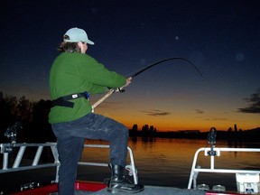 Fishing for sturgeon during a November evening on the Fraser River.