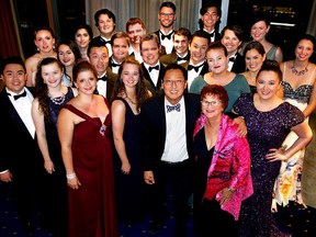 Members of the UBC Opera Ensemble surrounded UBC president Santa Ono and  voice-and-opera professor following their concert in the Sheraton Vancouver Wall Centre ballroom.
