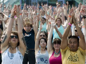 Hundreds turn out to Jack Poole Plaza for a yoga class as part of Lululemon's SeaWheeze festivities.