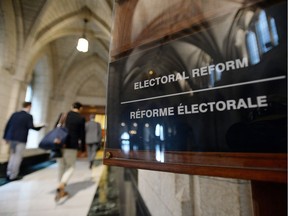 People arrive to an electoral reform committee on Parliament Hill in Ottawa on Thursday July 7, 2016.