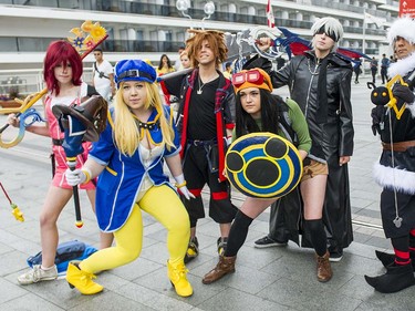 A group costumed as characters from the video game Kingdom Hearts pose at Anime Revolution, a three-day convention of  activities, exhibits, panels and performances of the popular Japanese-born anime art form in Vancouver Sunday August 7, 2016.